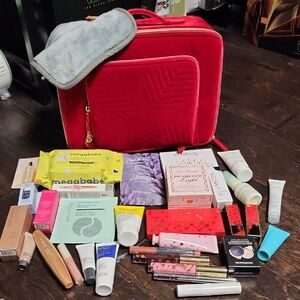 Red Quilted Travel Bag with Assorted Beauty Products